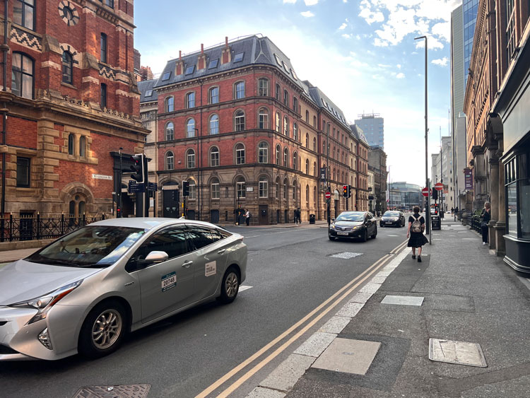 Leeds city centre street scene with traffic — Road Traffic Law specialists